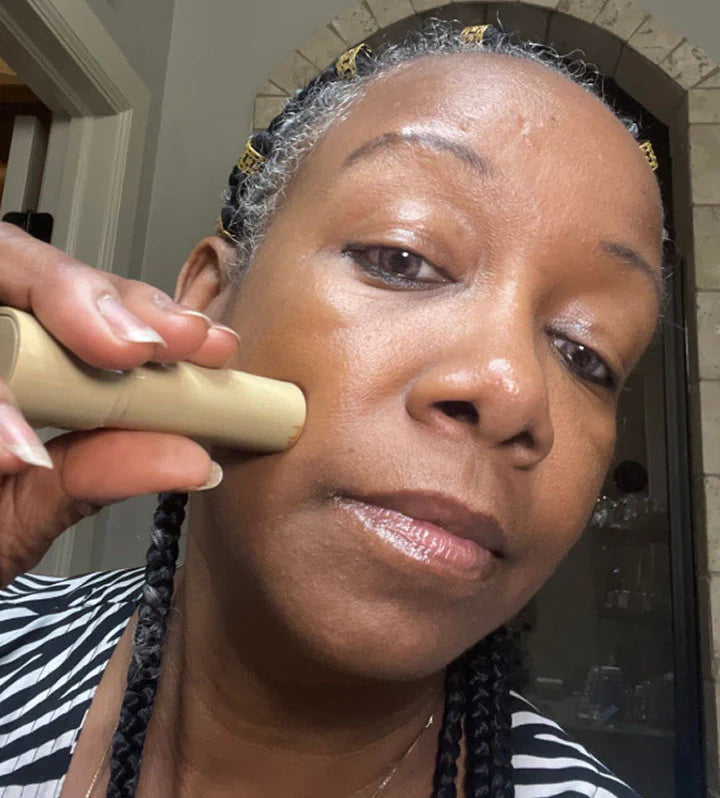 Tasha using the balm